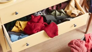 How to Clean Out Your Jam Packed Closet Once and for All